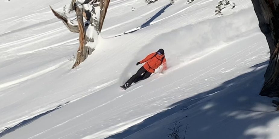 Chris Engelsman lays down a turn while testing The North Face's FutureLight outerwear
